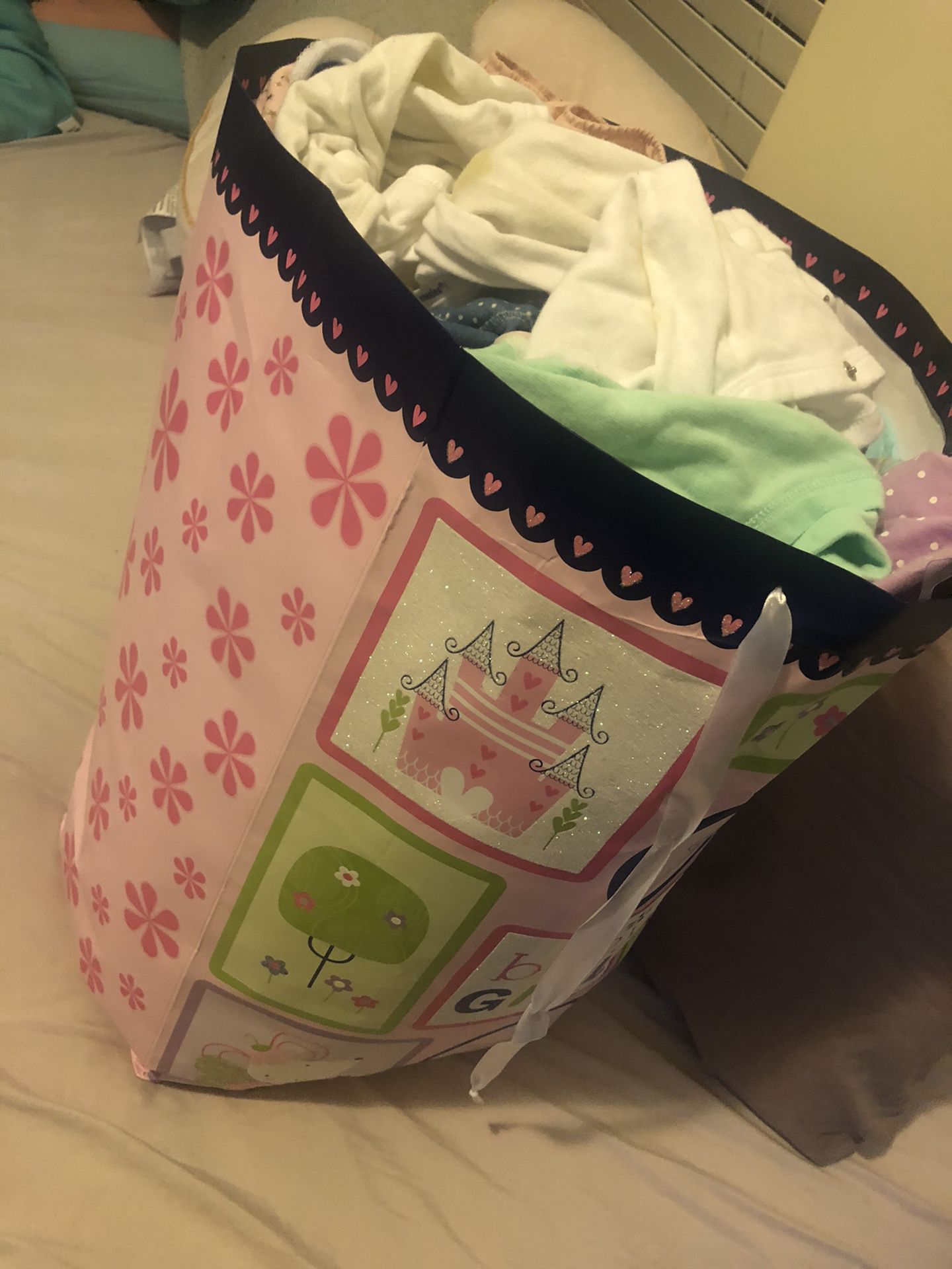 Bag of baby clothes