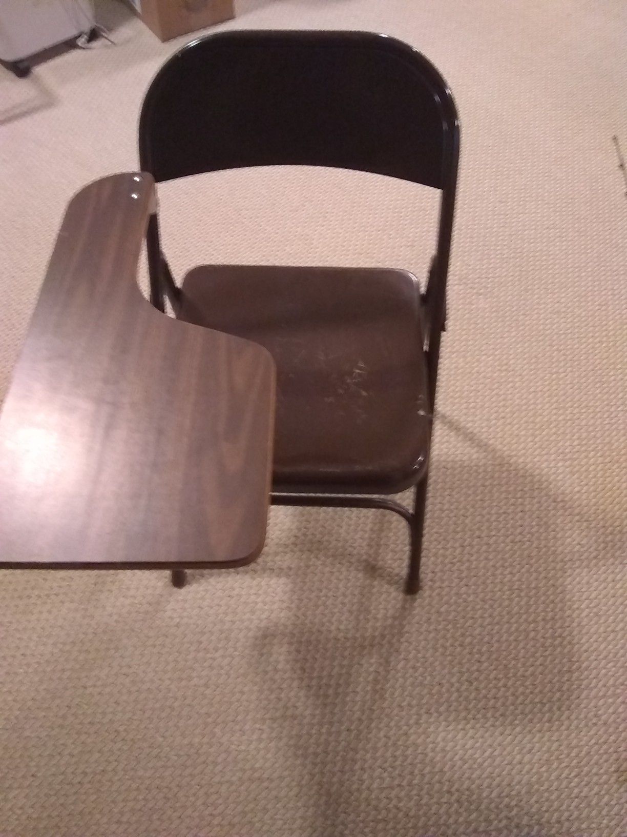 Folding metal chair with desk top