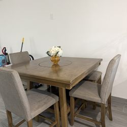 Brown Dining table from living spaces 
