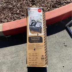 Baby crib with changing table and a bassinet. 