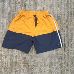 Nike Men’s Swim Trunks  Sz L Shorts Orange Blue Colorblock Beach NESSA568-724  Bold yellow Nike shorts with drawstring. Perfect for active wear.