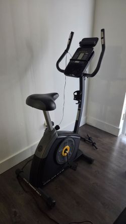 Gold gym bike trainer- exercise- health - yoga - stretch