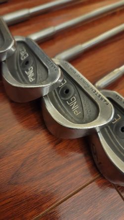 A set of ping eye 2 black dot( 4,5,6,7,9 irons), callaway driver, taylormade 320 T. Driver, nike 3w