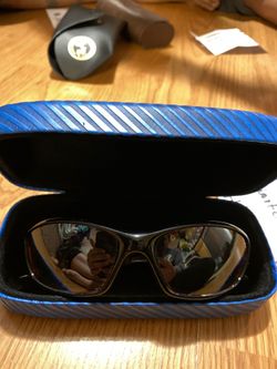 Oakley straight black sunglasses