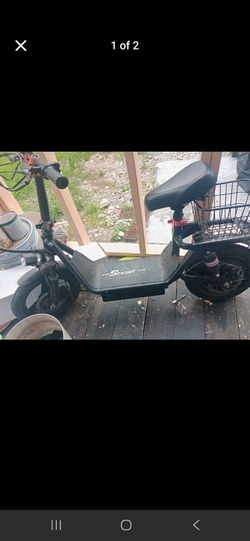 Electric seated scooter