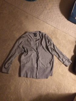Light. Gray sweater