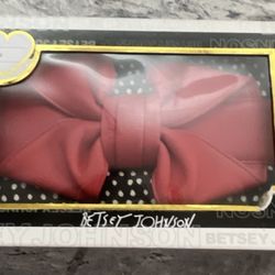 Betsey Johnson wristlet polka dots with red bow