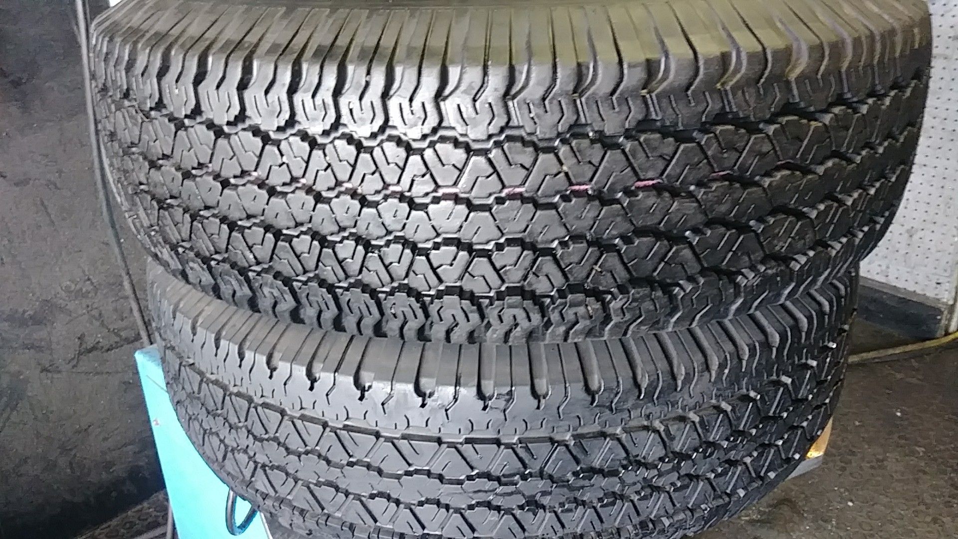 Set of 4 matching used tires Goodyear Wrangler 235/75R15 with the installation