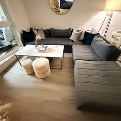 Beautiful CB2 gray sectional sofa in excellent condition.