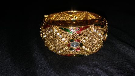 Ornate gold plated womens bracelet