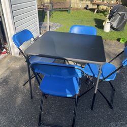Nice folding  dining table with 4 chairs