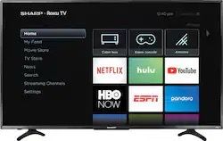 Sharp 55 inch Roku tv with TV stand attached
