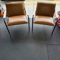 Brown leather chairs
