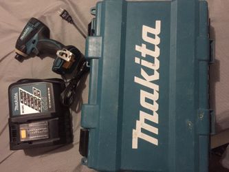 Brand new Makita Charger and Drill