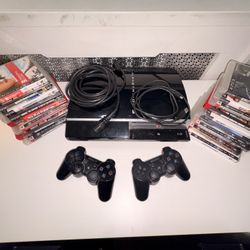 Playstation 3, With  A Bunch Of Games Included