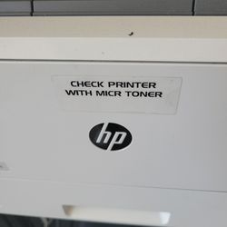 CHECK PRINTER WITH MAGNETIC TONER 