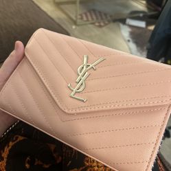 YSL light pink clutch purse