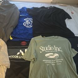 T Shirts/Jerseys + Rain Coat.    All used but like new.