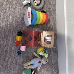 Fisher price stacking tower, Ikea crib mobile, Shape sorter House And IKEA toys