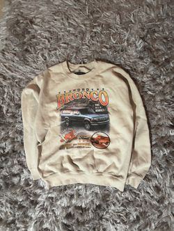 Ford Bronco sweatshirt in beige with classic logo graphic.