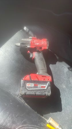 Milwaukee 1/2 inch impact with x c5.0 battery