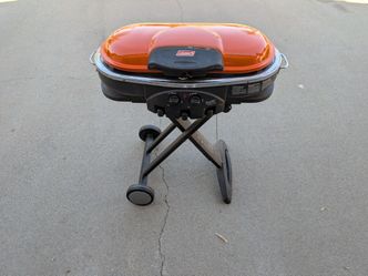 Orange Coleman portable grill
