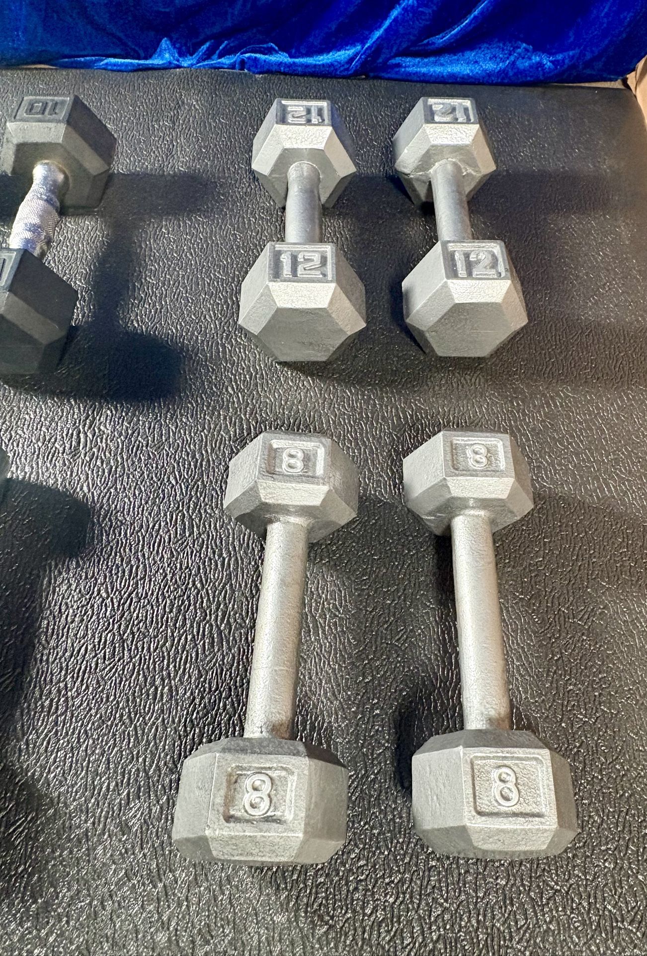 Set of Hex Cast Iron Dumbbells ( light) 12#, 10#, 8# and 5 #   In total: 70 pounds.