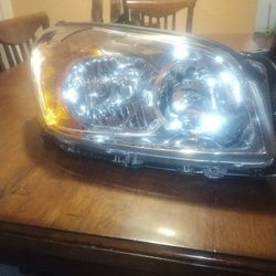 Brand new 07 Rav4 Passenger headlight asking 50 obo!!