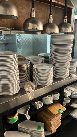 Various assortment of plate ware from closed restaurant