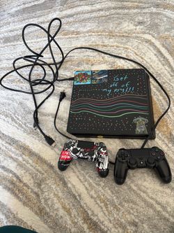 Sony PS4 Slim Console with Two Controllers