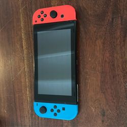 Nintendo switch and games with a bunch of controllers