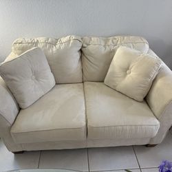 Loveseat and chair with table 