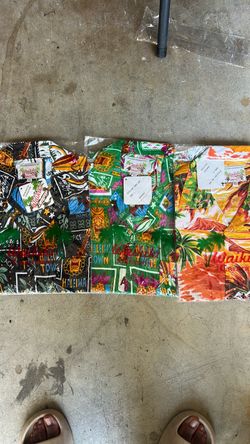 Tropical men button up shirts, indifferent sizes. All new. Some open, some not