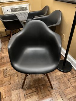 4 Black Molded Chairs 