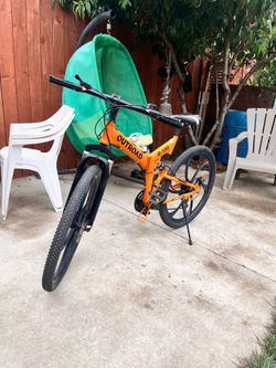 Orange Mountain bike (negotiable price)