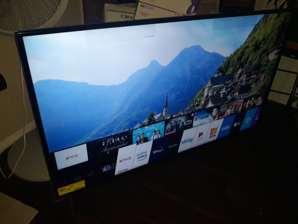65 inch Lg Thin Q Smart TV original remote feet moving need gone tv is a 2019 model asking 525 obo amazing picture