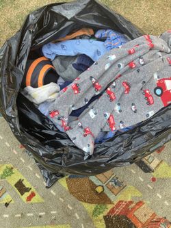 Bag of baby boy clothes.