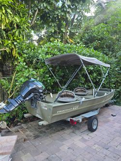 12' Tracker Topper Jon Boat + 9.9HP LEHR Motor & Trailer