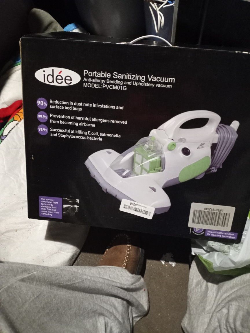 Portable Sanitizing Vacuum