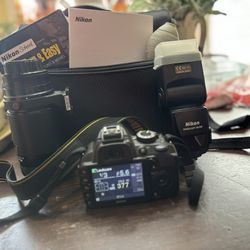 Nikon D3100 With Extra Lens & flash 