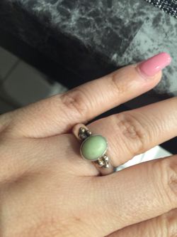 Sterling ring size 7.. 8 grams. With green Gem stone $17