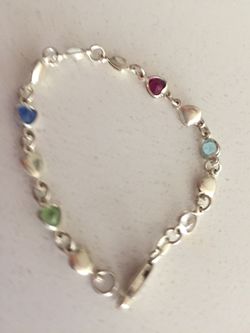 Silver bracelet with multiple colored heart crystals