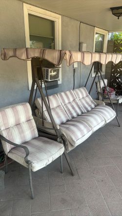 Outside swing with the chairs to go with it