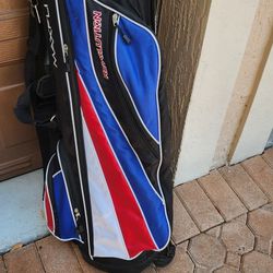 golf clubs bagg and ball 