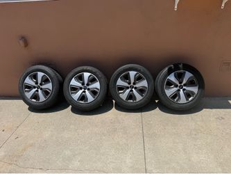 Kia OEM Wheels -205/60/16 like new tires