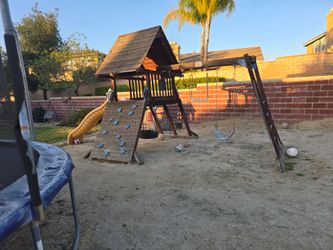 Swing set with slide
