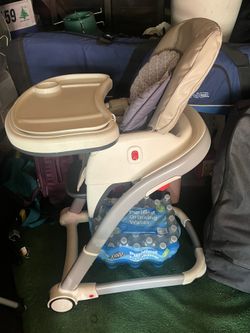 Multi feature high chair