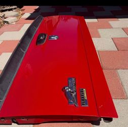 In great condition for the year This red Ram Tailgate was removed from a 2008 Dodge Ram 1500 For sure fits more years and models With from Ram Embl