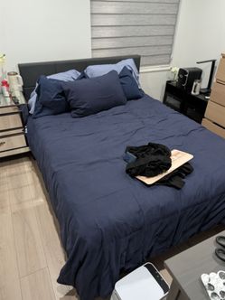 Queen bed with mattress and frame