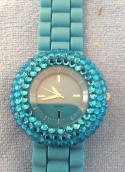 Blue watch with blue rubber band